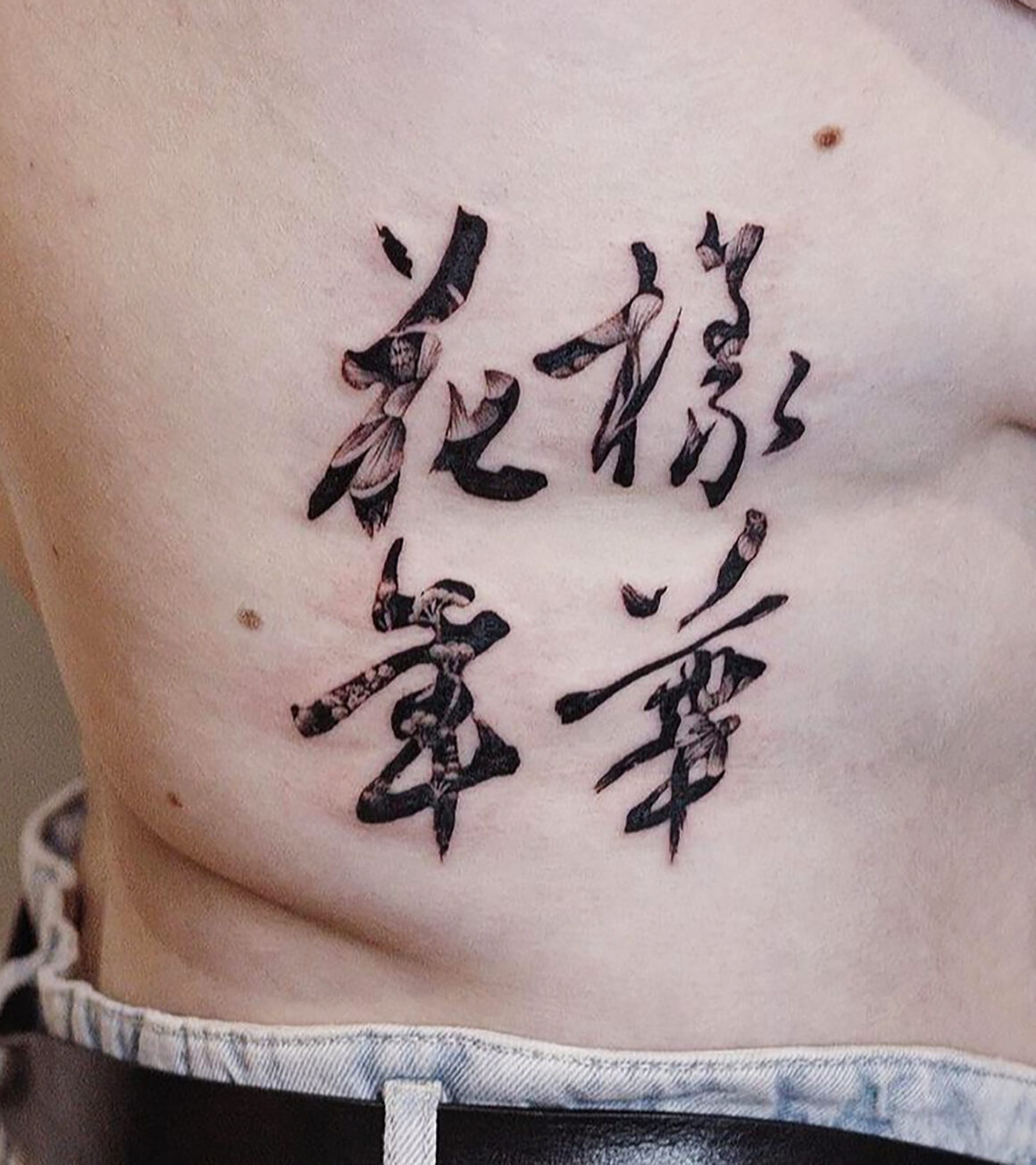 Tattoo by Yung Chi Ku Evennou, @tattooku
